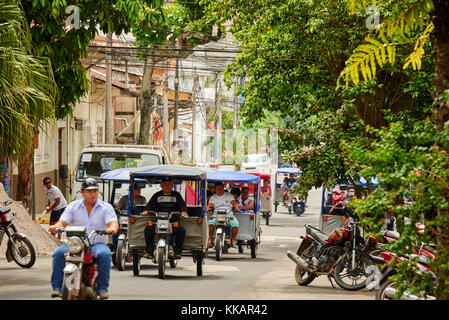 Mototaxis in a busy street in Iquitos, Peru, South America Stock Photo