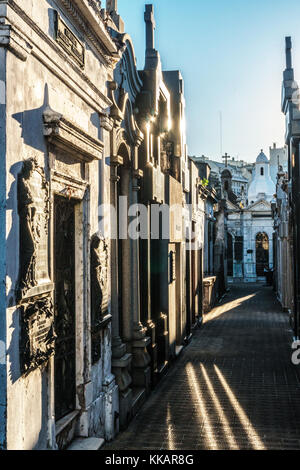 Vaults in evening sun in La Recoleta Cemetery, which lies right in the heart of the city, Buenos Aires, Argentina, South America Stock Photo