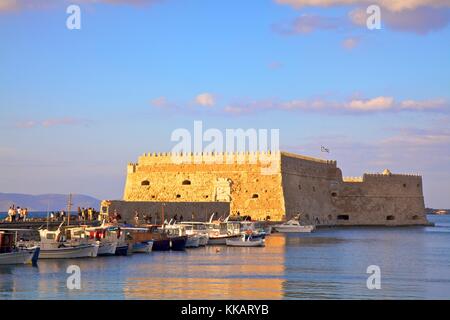 The boat lined Venetian Harbour and Fortress, Heraklion, Crete, Greek Islands, Greece, Europe Stock Photo