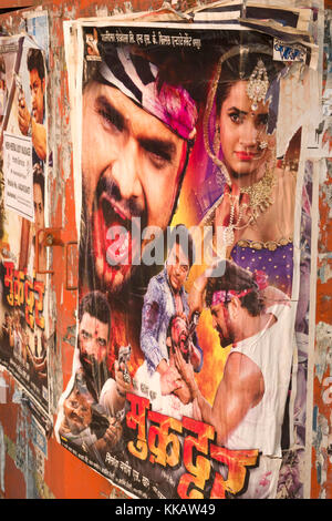 Bollywood movie poster posted in public place advertising latest film Stock Photo