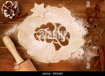Festive cookie dough with the shape of a brain cut out (series) Stock Photo