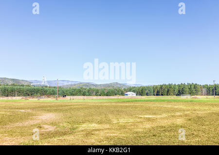 Rural West Virginia scenery with Green Bank radio Telescope in distance and farm countryside in autumn Stock Photo