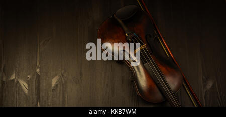 Violin in vintage style on wood background with copy space Stock Photo