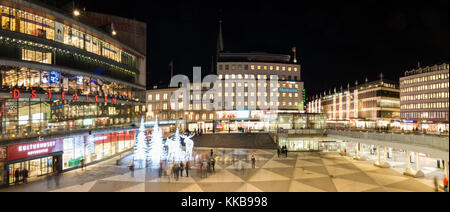 STOCKHOLM, SWEDEN - DECEMBER 9, 2016: Night view over Sergels Torg decorated with moose and trees sculptures made from led lights during Christmas sea Stock Photo