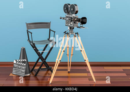 Cinema concept. Movie camera with film reels, chair, megaphone