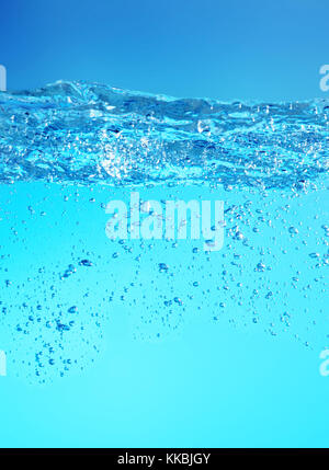 Water and air bubbles over light blue background Stock Photo