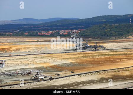 open pit coal mine with giant excavators Stock Photo