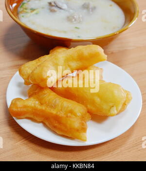 deep fried dough stick and rice porridge with pork Stock Photo