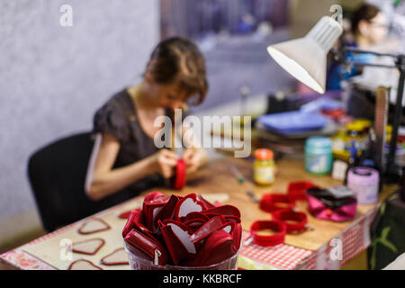 woman manufacturing purses Stock Photo