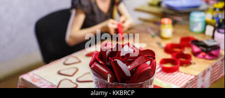 woman manufacturing purses Stock Photo