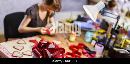 woman manufacturing purses Stock Photo