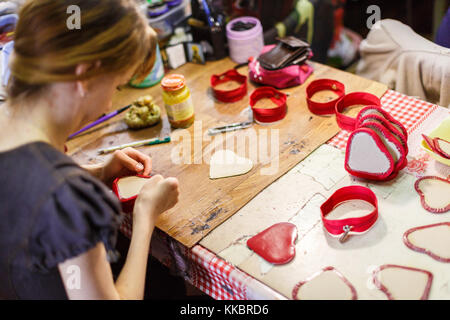 woman manufacturing purses Stock Photo