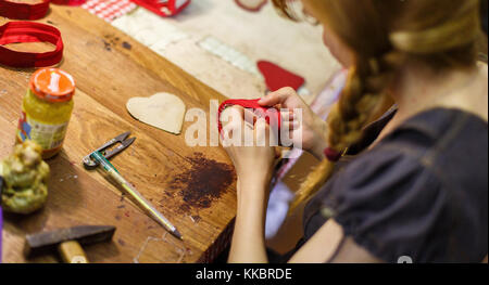 woman manufacturing purses Stock Photo