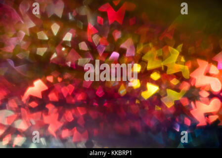holiday multicolored lights baground with bokeh shapes Stock Photo