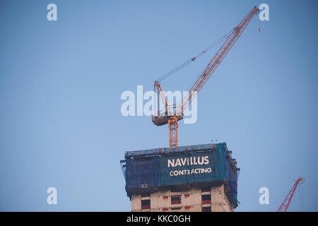 A banner for Navillus Contracting atop Brookfield's Manhattan West development in New York on Sunday, November 26, 2017. Navillus recently filed for bankruptcy protecting citing issues in court-ordered union payments.  (© Richard B. Levine) Stock Photo