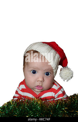 Cute Santa baby with dumbfounded face dressed in red sanata hat and stripped red jacket  isolated on white background. Can be used for design of banne Stock Photo