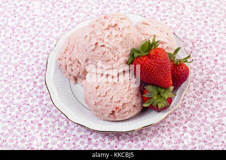 white plate with strawberry ice cream Stock Photo