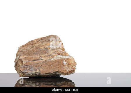 Big stone on black granit Stock Photo