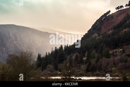 Part of Wicklow way leading through Mountains in Glendalough Lower Valley, co. Wicklow, Ireland Stock Photo