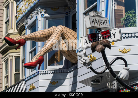 Giant lady legs leaning from the window of a gift store in Haight-Ashbury district, San Francisco, California, USA Stock Photo