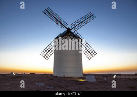 Illuminated traditional windmill at rising, Campo de Criptana, Spain Stock Photo