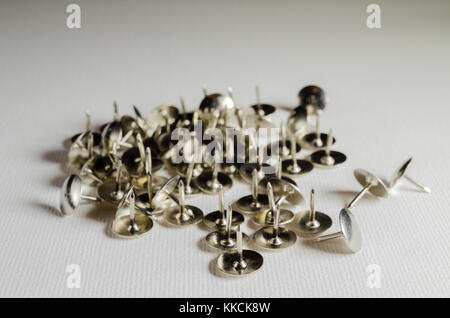 A Studio Photograph of a Silver Drawing Pins Stock Photo