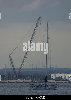 Yacht Cat Zero on the River Humber viewed from Paull Stock Photo