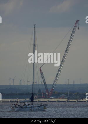 Yacht Cat Zero on the River Humber viewed from Paull Stock Photo