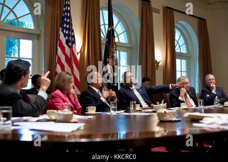 President Barack Obama meets with Congressional Leadership in the Cabinet Room of the White House to discuss ongoing efforts to find a balanced approach to the debt limit and deficit reduction, July 13, 2011. Pictured, from left, are: House Majority Leader Eric Cantor, House Minority Leader Nancy Pelosi, House Speaker John Boehner, Senate Majority Leader Harry Reid, and Senate Minority Leader Mitch McConnell. Stock Photo