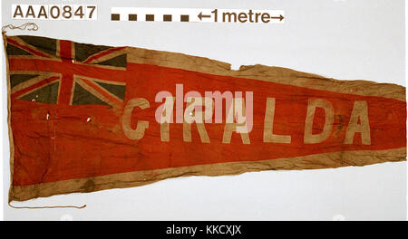 Name pennant of Thames sailing barge 'GIRALDA' 1897. Machine-sewn wool bunting. The ship's name in white letters on a red background with white borders and the Union Flag in the canton.  Rope and toggle attached. Hand repairs. RP/33/21 does not contain unique number or scale.  AAA0847 Record Shot - Do not reproduce. RMG RP-33-21-2 Stock Photo