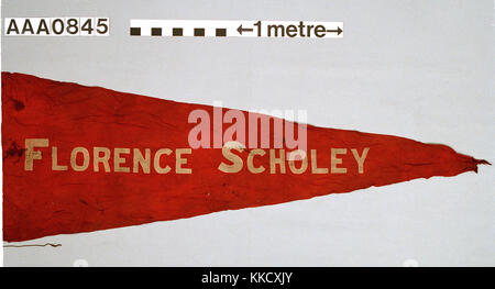 Name pennant of the sailing barge 'FLORENCE SCHOLEY' 1904. Machine-sewn wool bunting in red with the ship's name in white letters. Rope and toggle attached. RP/33/24 does not contain unique number or scale.  AAA0845 Record Shot - Do not reproduce. RMG RP-33-23-4 Stock Photo