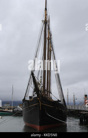 fishing boat sails into San Francisco Bay in the morning with days ...