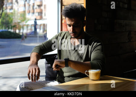 Man remembered funny joke and laughing, slow motion.  Stock Photo