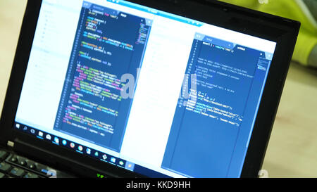 Programmer occupation - writing programming code on laptop. Coding code program programming developer compute web development coder work design softwa Stock Photo