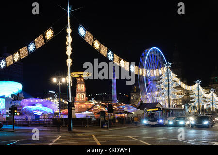 Glasgow, George Square Christmas lights and fairground attractions Stock Photo