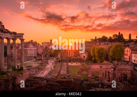 Rome and Roman Forum in Autumn (Fall) on a sunrise with beautiful stunning sky and sunrise colors Stock Photo