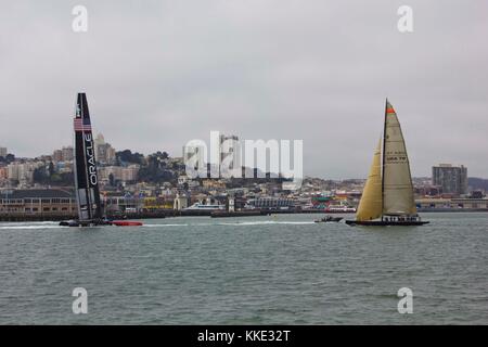 SAN FRANCISCO, USA - AUGUST 12 2013: Sailing in San Francisco. Sailing boat on the Pacific ocean with San Francisco Skyline in the background in a dul Stock Photo
