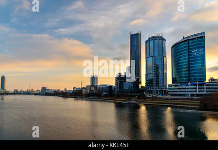 Yekaterinburg, Russia - 11 November, 2017: View of commercial district Yekaterinburg-City on sunset. With Buildings of Regional Government and Parliam Stock Photo