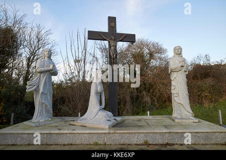 crucifix and brigid statue shrine st brigids shrine county louth republic of ireland Stock Photo