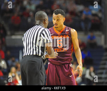 Virginia Tech guard Justin Robinson (5) scores against Washington ...