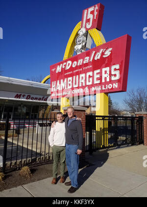 Des Plaines, USA. 2 December, 2017. The Rev. Tim Mitchell of Coventry, West Midlands, England, UK, (left) and friend Gary Smogolski of Mount Prospect, IL, USA, pose for a photo in front of the endangered McDonald's No. 1 Store Museum on Saturday, Dec. 2, 2017 in Des Plaines, IL, USA. Credit: Apex MediaWire/Alamy Live News Stock Photo