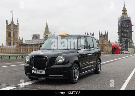 London, UK. 5th Dec, 2017. A new electric TX eCity taxi runs on street in London, Britain on Dec. 5, 2017. London launched the new electric-powered black cabs on Tuesday. Credit: Ray Tang/Xinhua/Alamy Live News Stock Photo