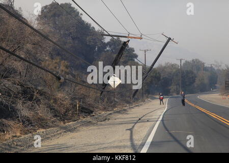 California, USA. 5th Dec, 2017. Damaged poles are seen in Ventura County of California, the United States, Dec. 5, 2017. Brush fires across the region were fed by extremely high winds, low humidities and dry fuel. Hundreds of fire fighters have been working very hard to minimize damage to property and evacuations are taking place in many places in south California, said authorities. Credit: Huang Heng/Xinhua/Alamy Live News Stock Photo