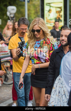 Milan, Italy - September 22, 2017: Chiara Feragni surrounded by fans and photographers before the Versace Fashion Show during Milan Fashion Week Spring/Summer 2018. Stock Photo