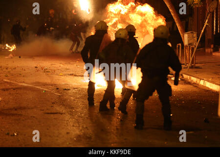 Athens, Greece. 6th Dec, 2017. Anti-riot police officers clash with demonstrators during a rally commemorating the death of a teenage student in Athens, Greece, on Dec. 6, 2017. Clashes with anti-riot forces ended a series of rallies organized by student unions, left-wing parties and anti-establishment groups in the center of Athens on Wednesday to mark the ninth anniversary of the fatal police shooting of the 15-year-old high school student Alexandros Grigoropoulos in 2008. Credit: Marios Lolos/Xinhua/Alamy Live News Stock Photo