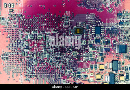 Red retro circuit board as a structure background. Stock Photo