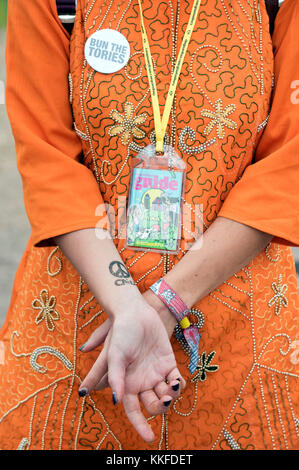 Festival goer with ‘Bun The Tories’ badge at Glastonbury 2017 Stock Photo