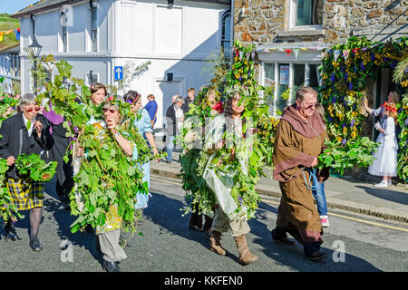 participants in the hal-an-tow pageant on flora day in helston, cornwall, england, uk. Stock Photo