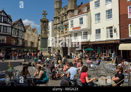 People eating and drinking in The Old Buttermarket. Canterbury, Kent UK Stock Photo