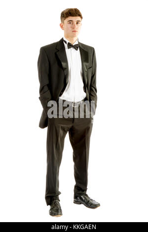 18 year old wearing a tuxedo isolated on a white background Stock Photo